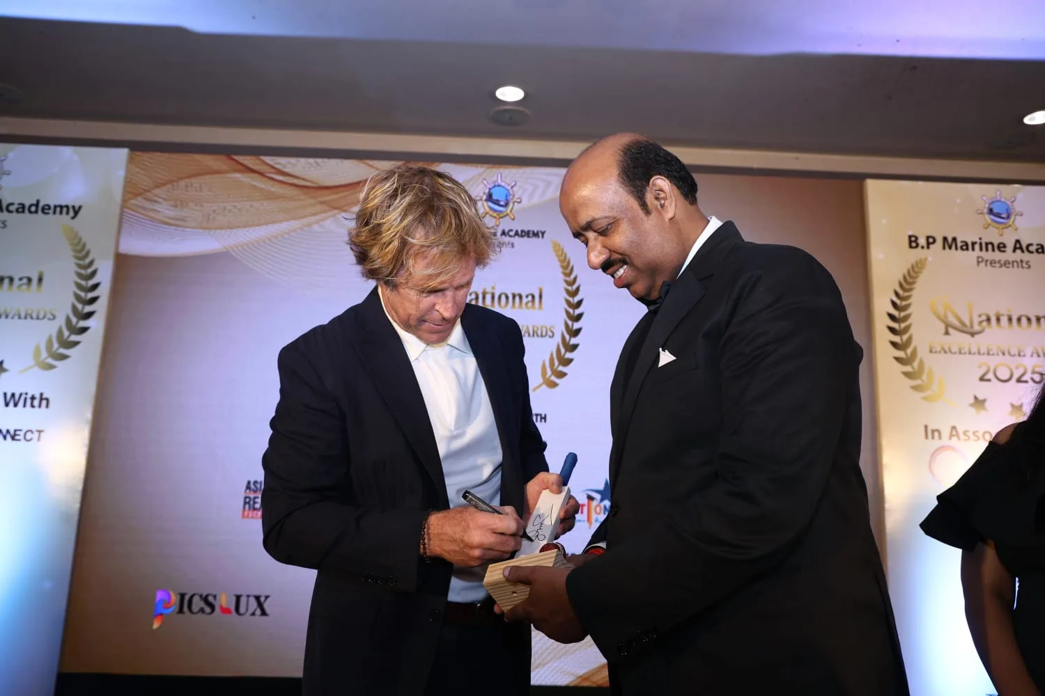 Dr. Sunil Kumar Singh receiving an international education award