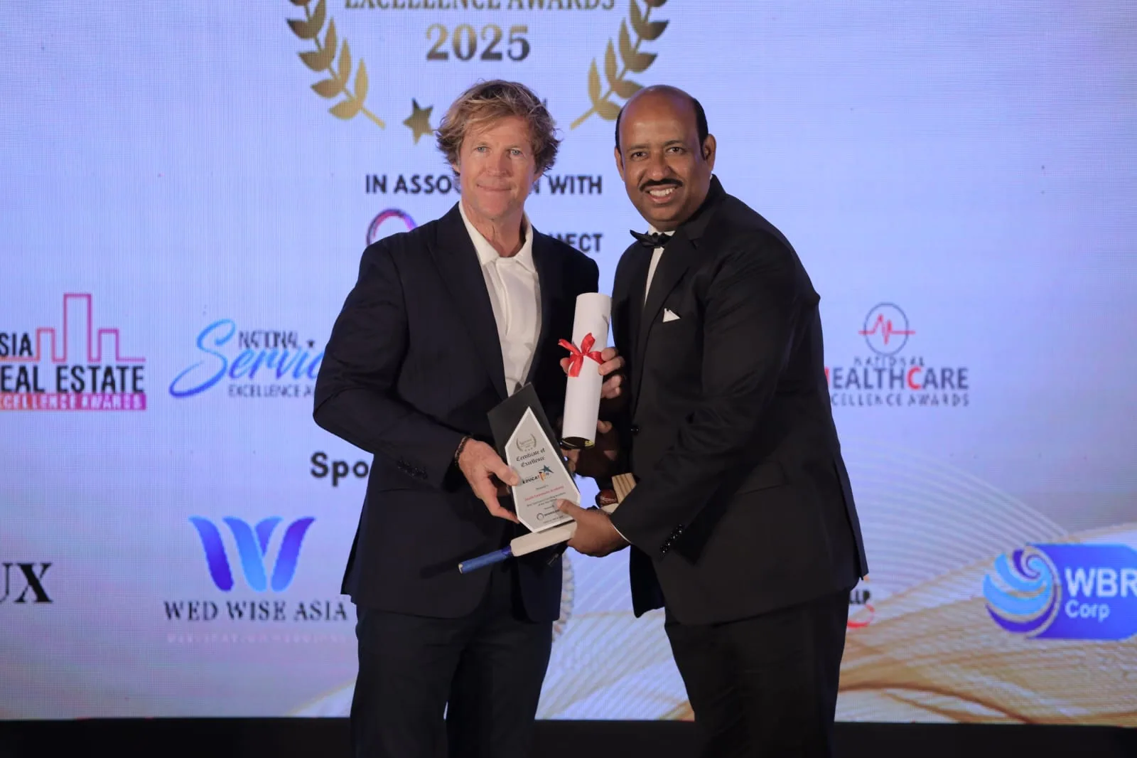 International excellence award presented to Zenith Commerce Academy director